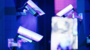 How does weather or environmental conditions affect the performance of an infrared illuminator?​